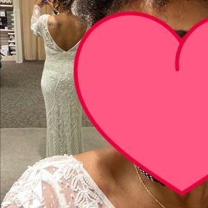 New wedding dress never been warned tags still on it